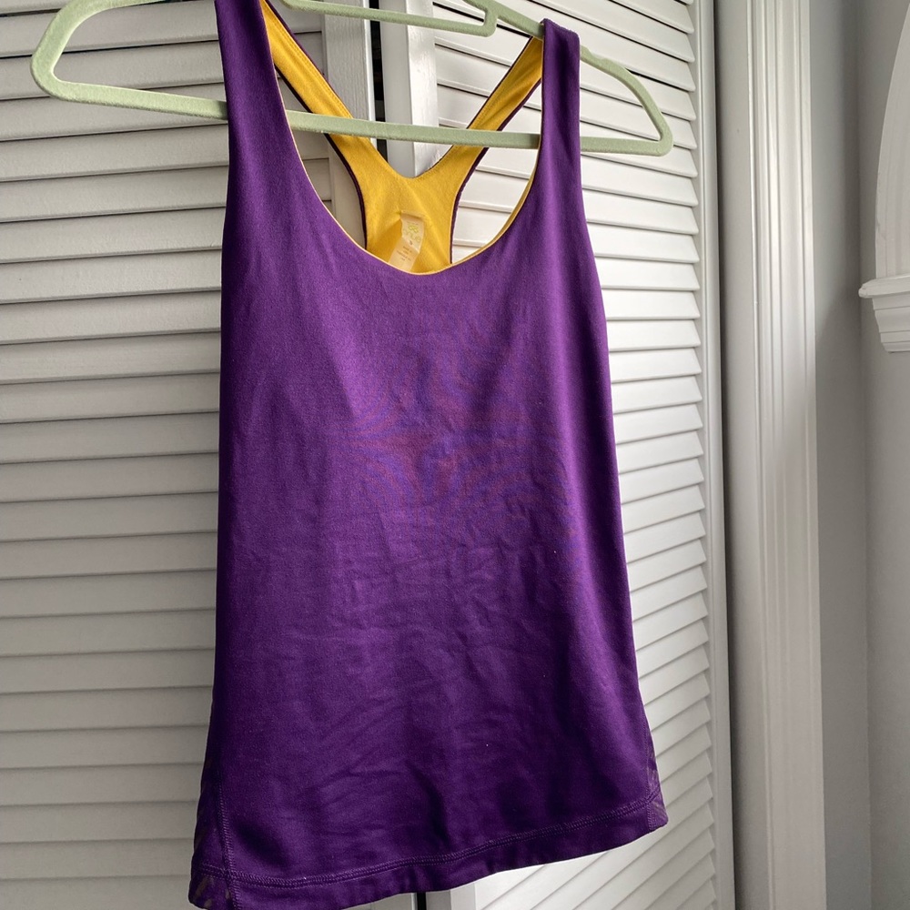 Purple and yellow workout top, size small